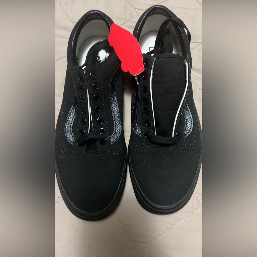 All black vans .